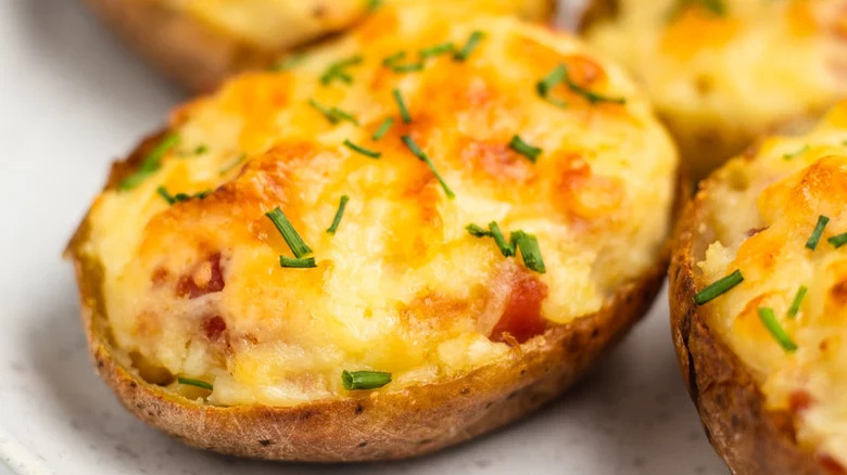 Baked potato skin stuffed with cheese