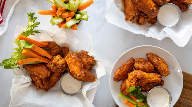 Chicken wings with veggie sticks and dips