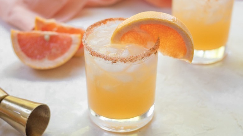 salt-rimmed cocktail with orange