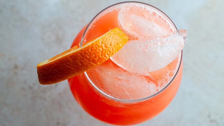 pink drink with orange slice