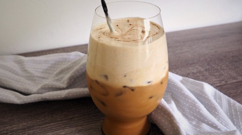 Glass of blended coffee drink with ice