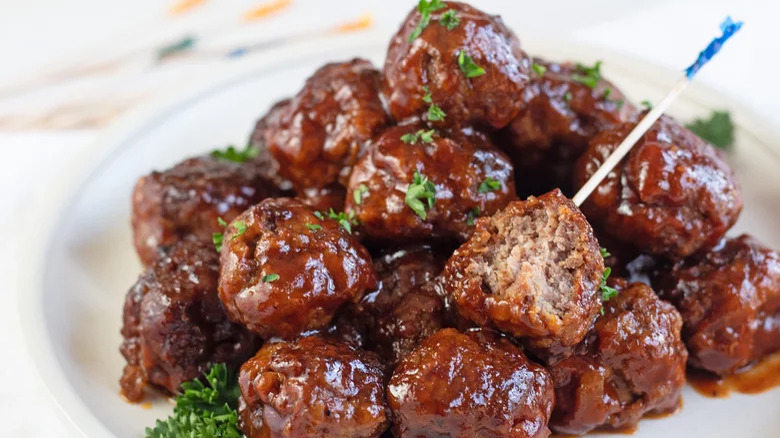 Meatballs with barbecue sauce and toothpick