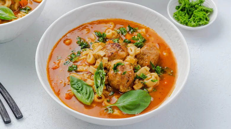 Meatballs in pasta with spicy soup