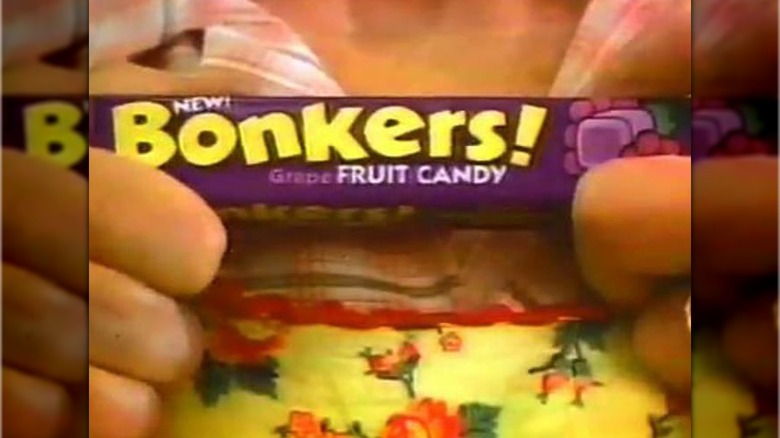 Woman's hands holding purple Bonkers wrapper