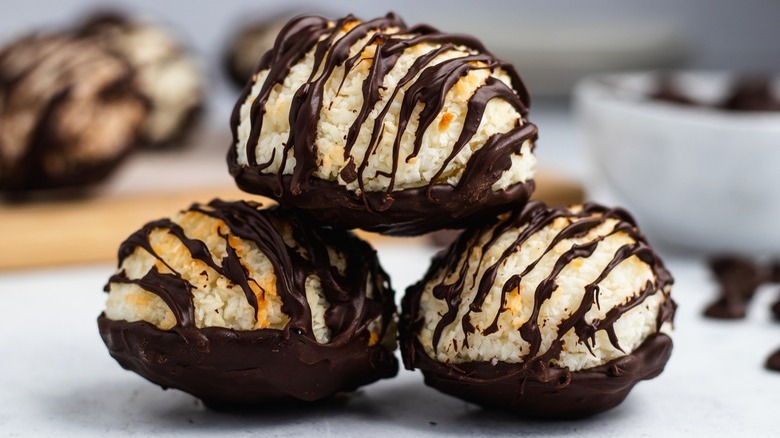 three chocolate-drizzled coconut macaroons