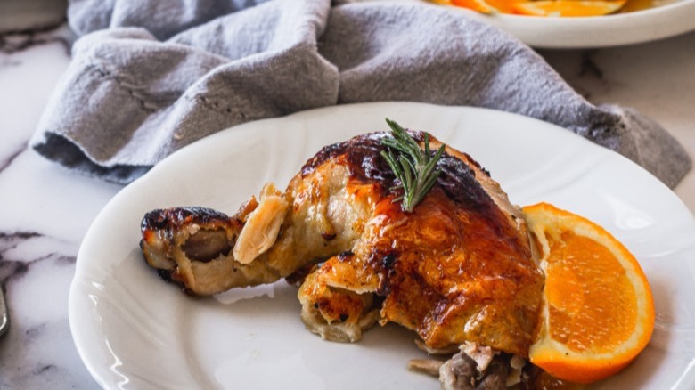 roast chicken with orange slice