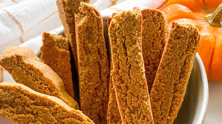 pumpkin biscotti in white bowl