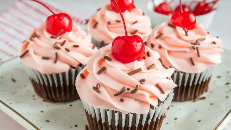 Chocolate cupcakes with pink frosting