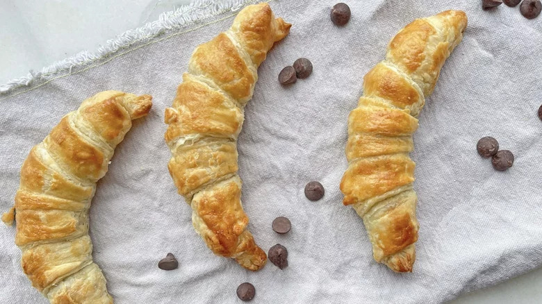 Croissants on cloth with chocolate chips