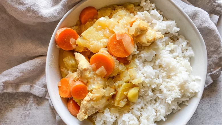 A bowl of rice and curry