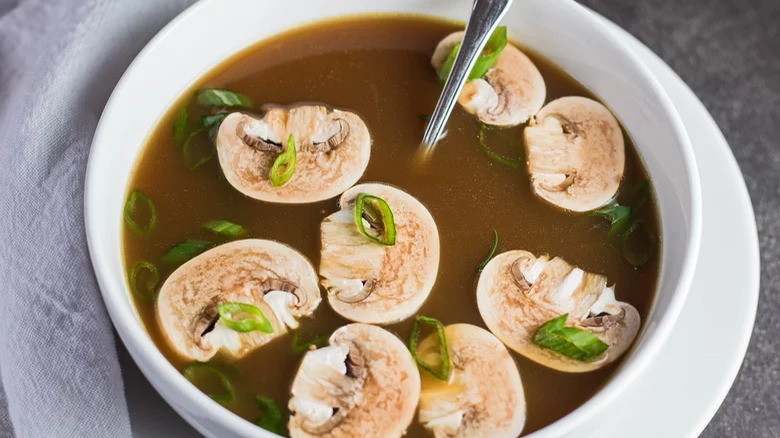 Clear soup in a bowl