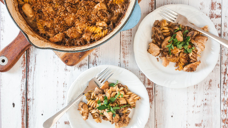 chicken pasta with herb garnish