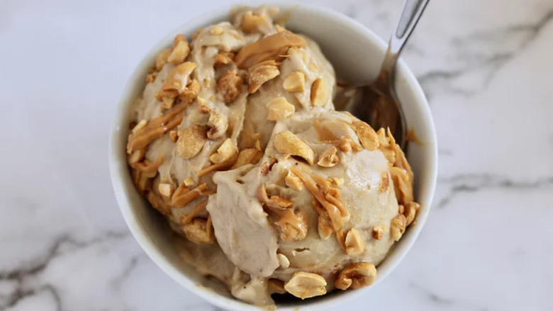 ice cream topped with peanuts