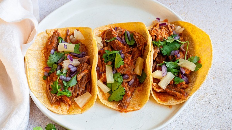 tacos al pastor on plate