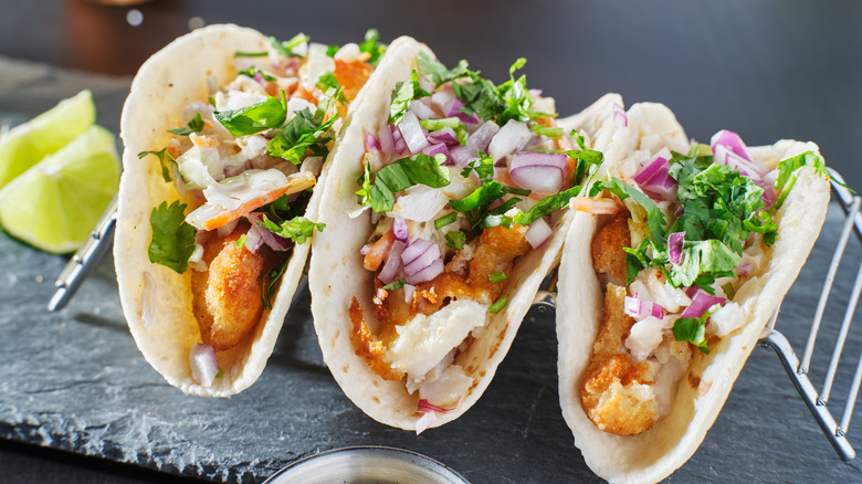 Fish tacos with lime, garnishes