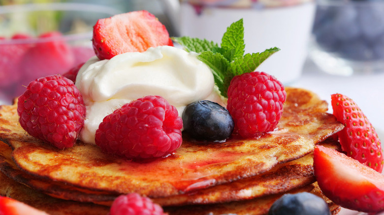 Keto pancakes with berries, cream 