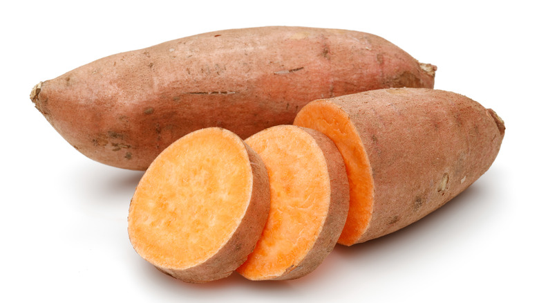 Whole and sliced sweet potato