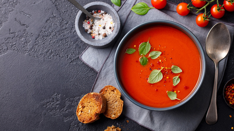 Tomato soup, basil, bread, tomatoes