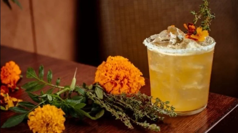 cocktail with flowers and herbs