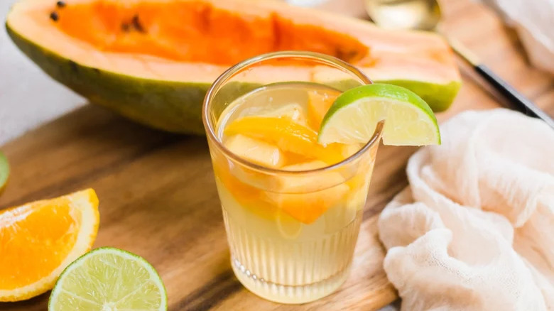 sangria with papayas, limes, oranges