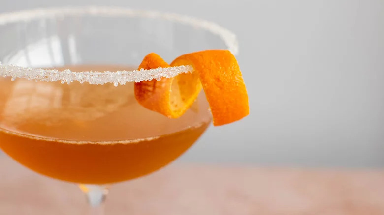 cocktail with orange peel garnish