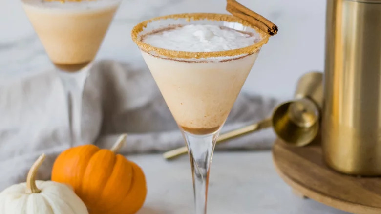 A martini with cinnamon sticks 