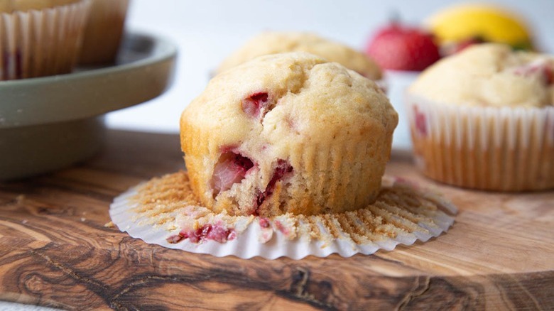 strawberry muffin on paper liner