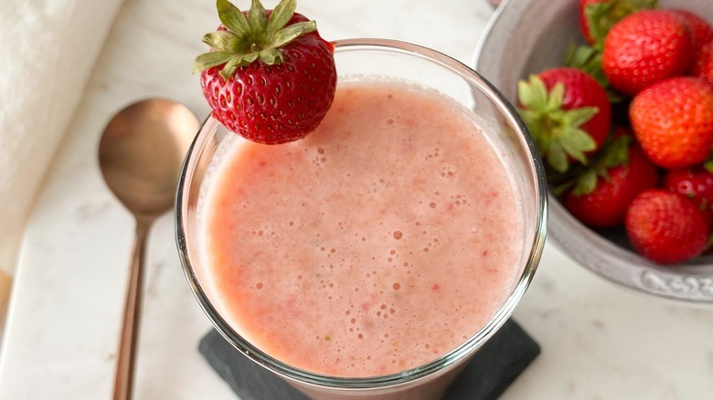 thin pinkish smoothie in glass