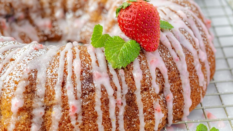 bundt cake with pale pink glaze