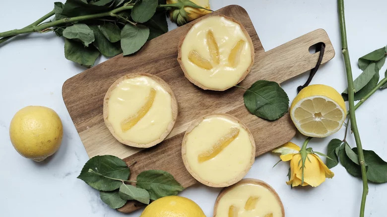 lemon tarts on a wooden board