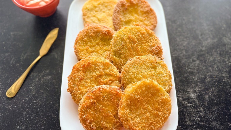 fried tomatoes on white platter