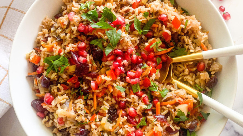 Rice pilaf with dried cranberries and pomegranate seeds.