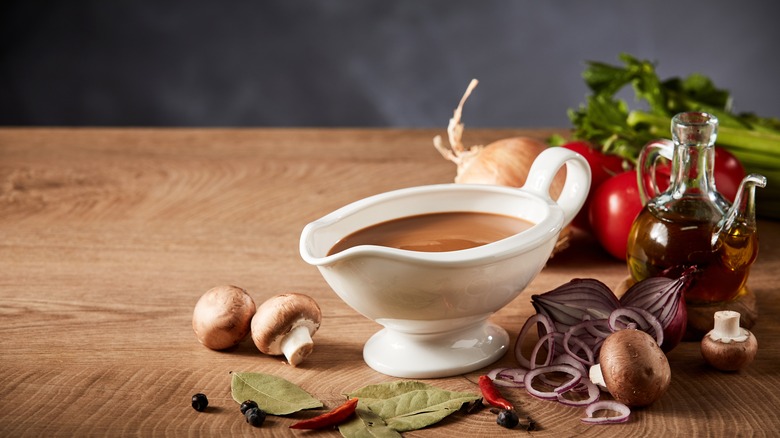 Gravy boat on wood table