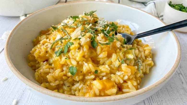 risotto in bowl with spoon