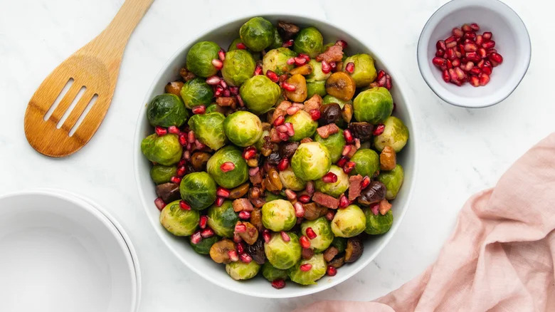 Brussels sprouts, pomegranate seeds, bacon, and chestnuts