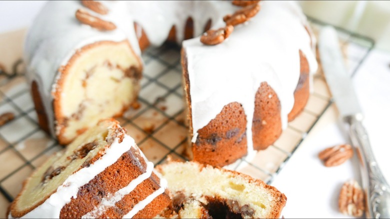 cake with glaze and pecans