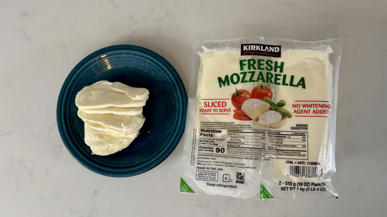 Two packages of mozzarella cheese