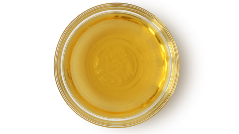 Glass bowl of apple cider vinegar