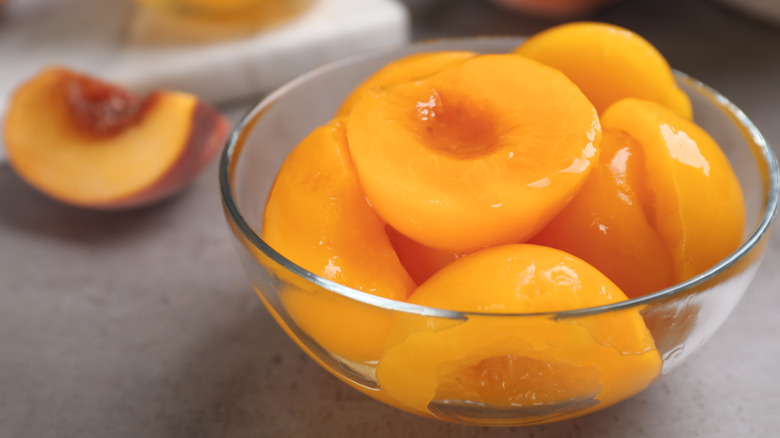Bowl of canned peaches