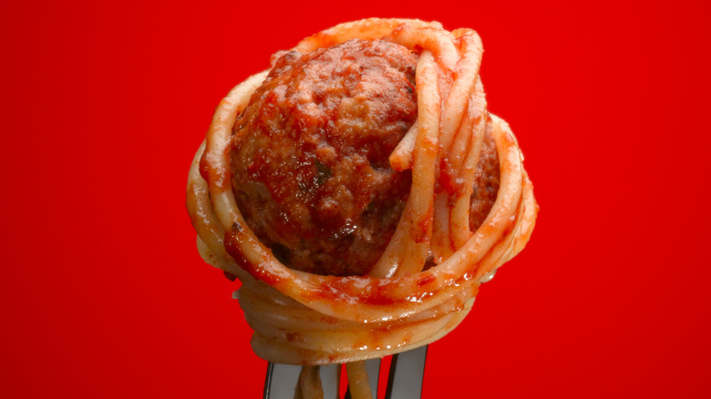 meatball and spaghetti on fork