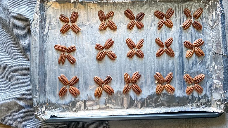 pecans on baking sheet