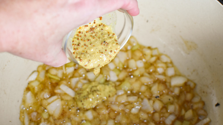 sautéing onions and adding Dijon