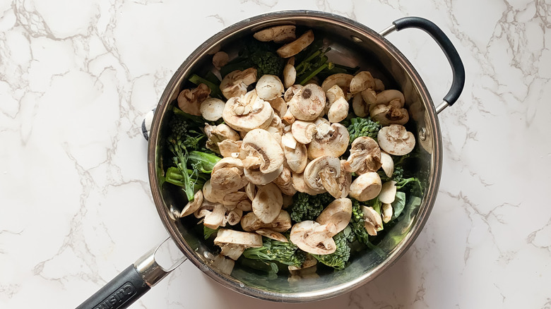 cooking vegetables in pan