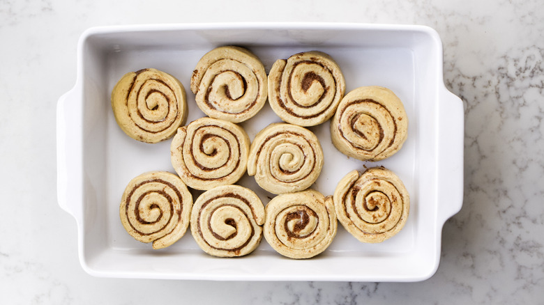 cinnamon rolls in baking dish 