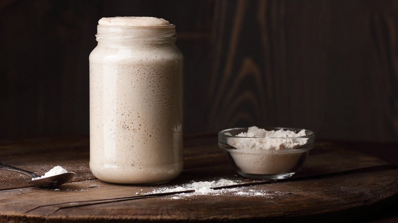 Jar of starter with flour