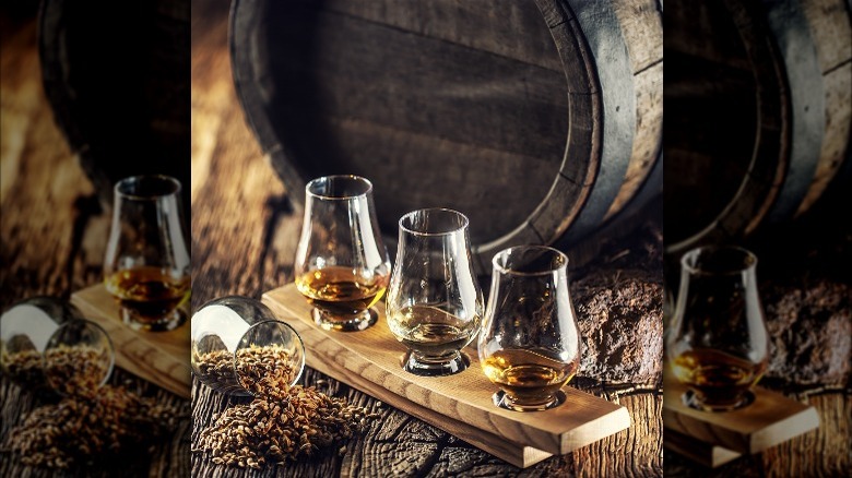 Whisky glasses and a barrel