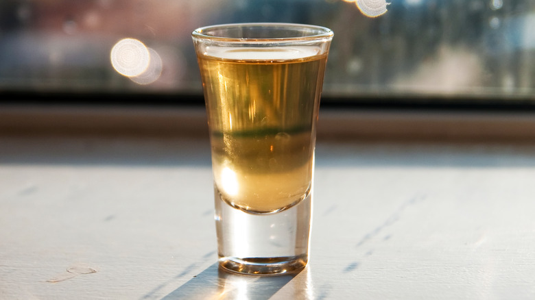 A shot glass of whiskey