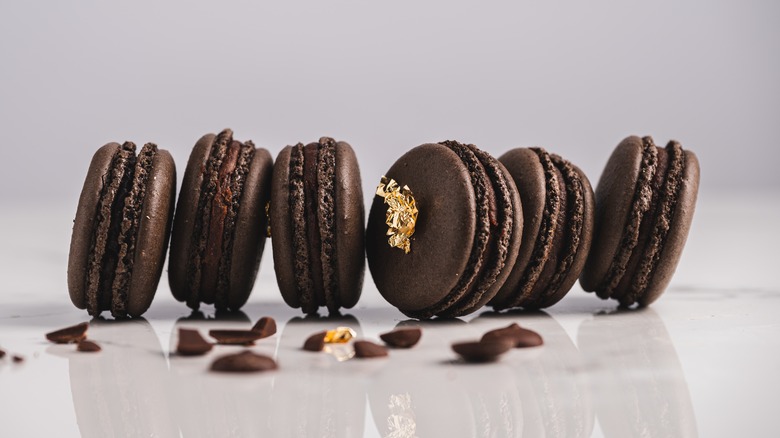 chocolate macarons lined up