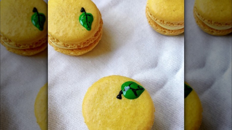 yuzu flavored macarons on white