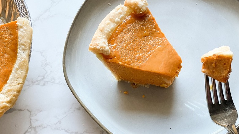 pumpkin pie slice on plate